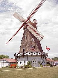 A windmill on a cloudy day