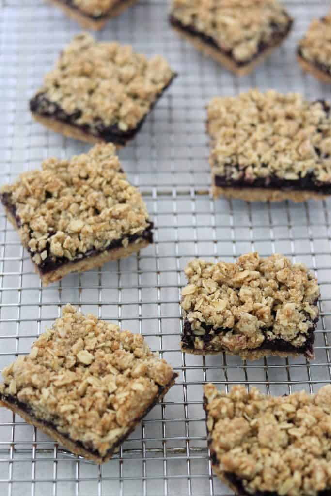 Blueberry crumble bars on a cooling rack
