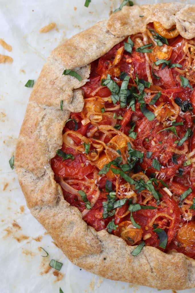 A close up of a rustic tomato tart