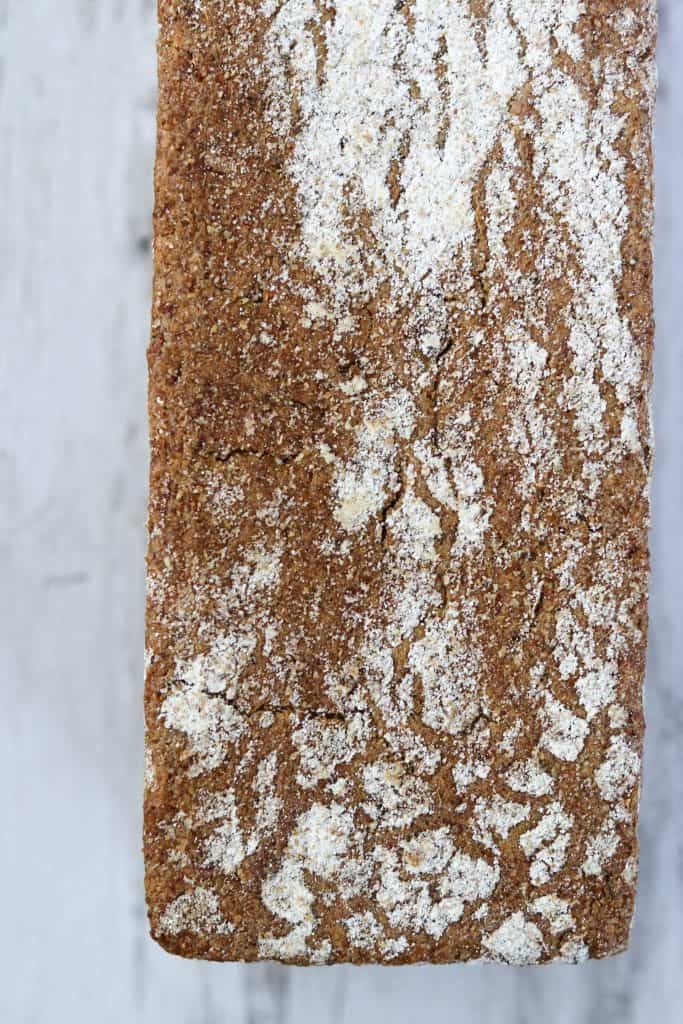 A close up of a loaf of rye bread
