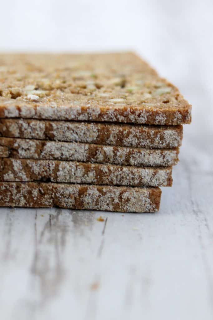 A close up of a stack of sliced rye bread