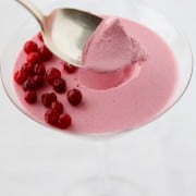 Lingonberry skyr mousse with lingonberries and a spoon