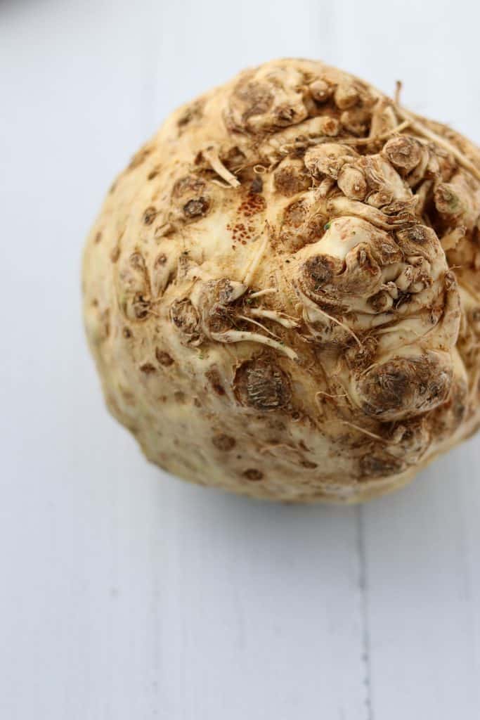 A close up of a celery root