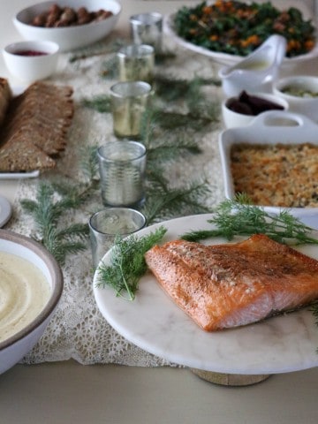 A table topped with food for a Scandinavian Christmas Eve smörgåsbord