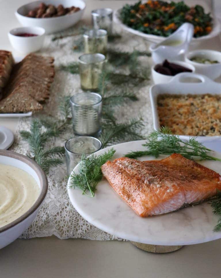 A table topped with food for a Scandinavian Christmas Eve smörgåsbord