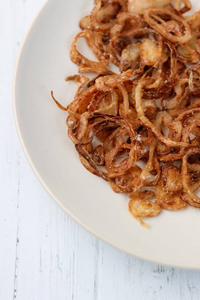 Crispy shallots on a plate