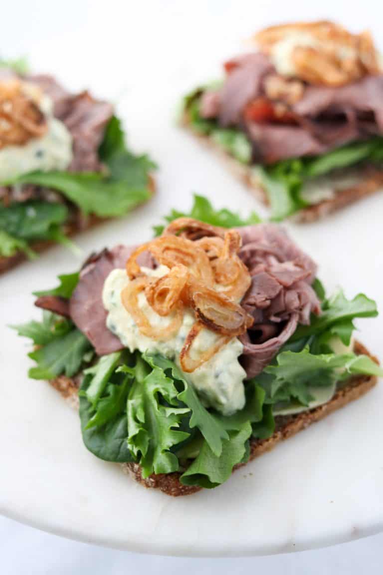 A open roast beef sandwich on a plate