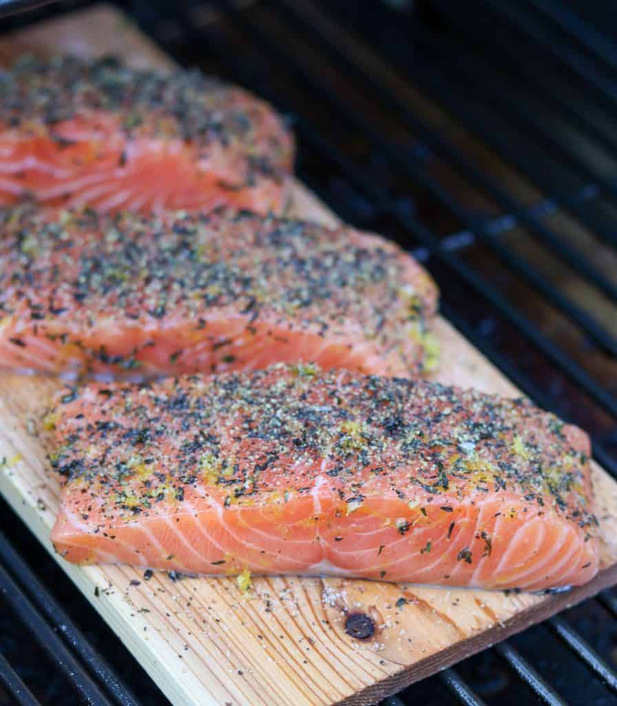 Salmon filets on a cedar plank on the grill