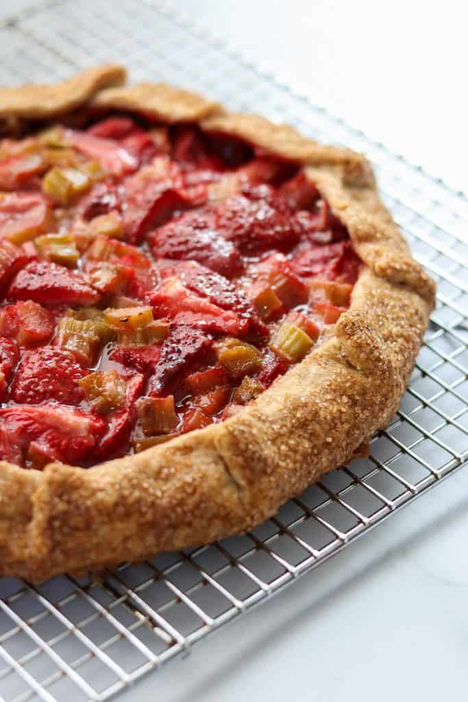 Strawberry rhubarb galette on a cooling rack