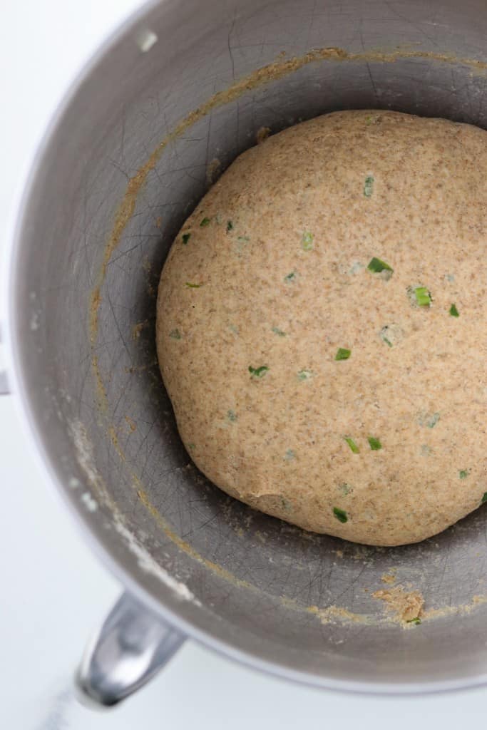 Flatbread dough in a silver bowl