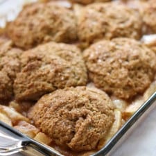 Gingerbread cobbler with apples and pears in a baking dish