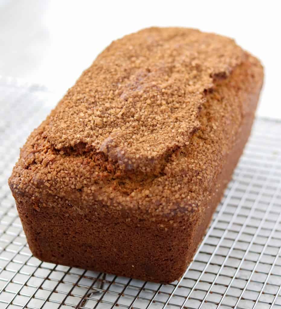 a loaf of pumpkin bread on a cooling rack