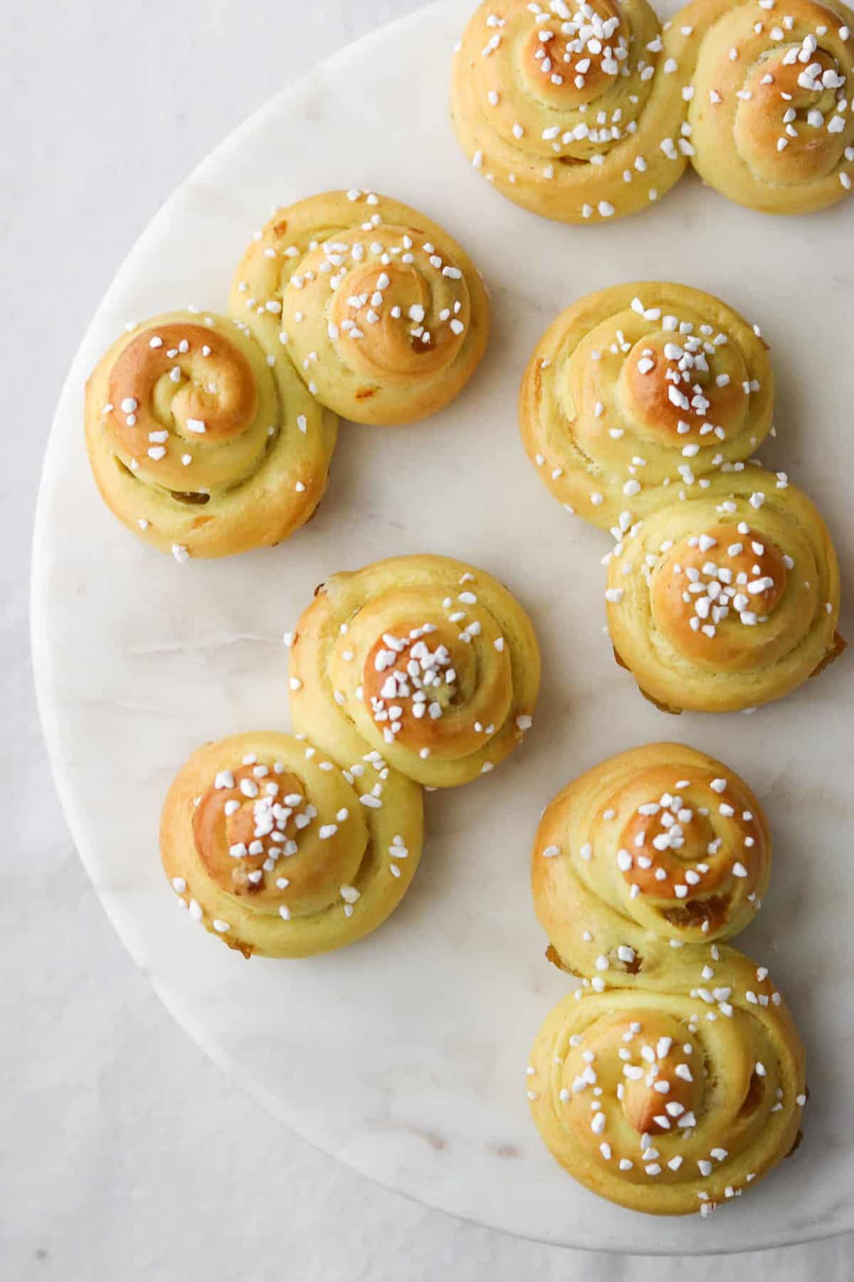 St. Lucia Buns on a marble plate.