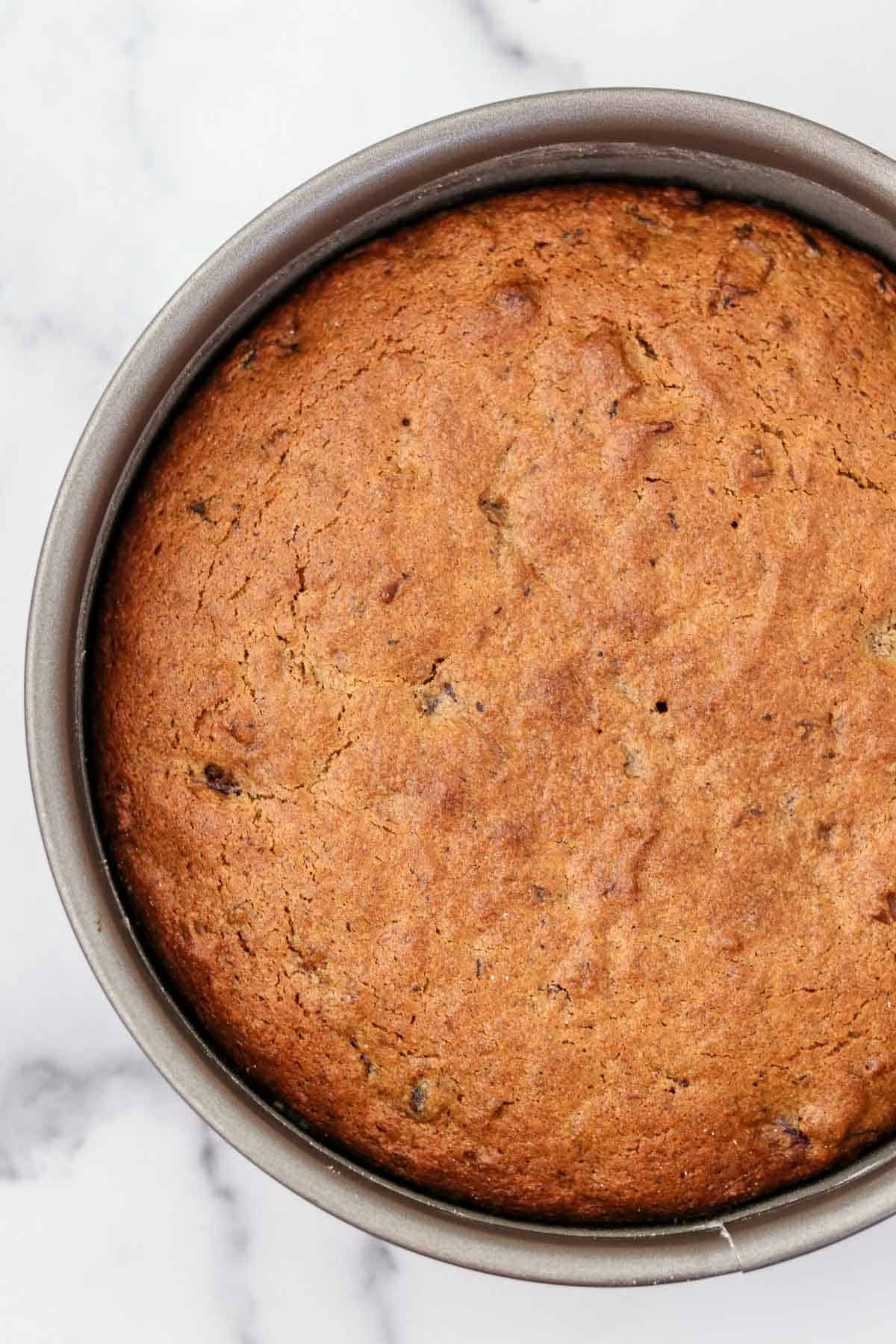 A date cake in a springform pan.