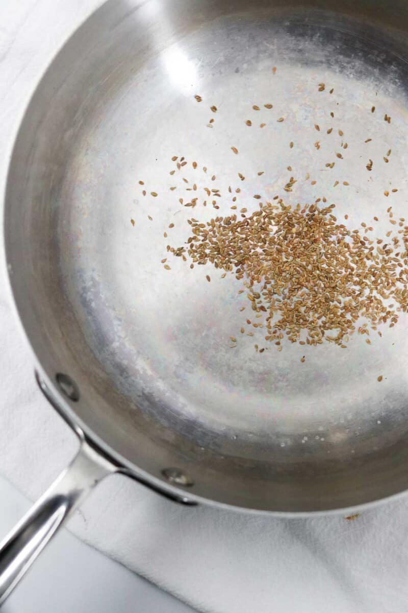 Seeds in a metal pan.