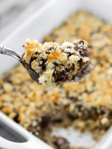 Closeup of a spoonful of Mushroom Gratin.
