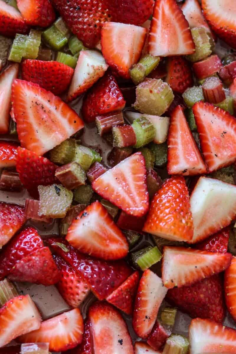 Close up of cut strawberries and rhubarb.