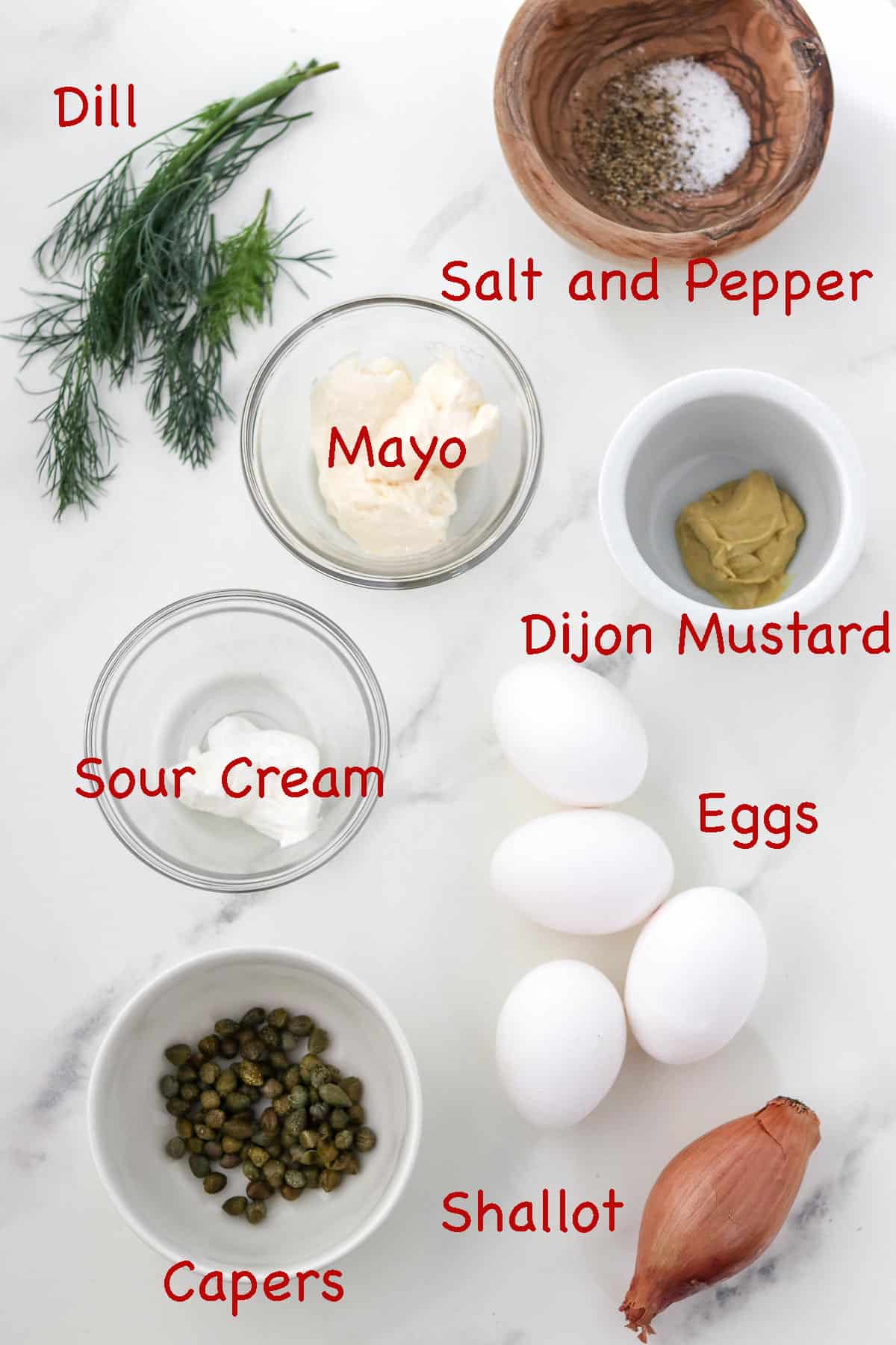 Labeled ingredients for Creamy Egg Salad with Dill and Capers.
