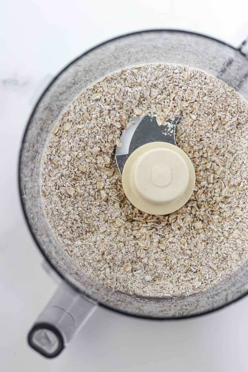 Chopped up oats in a food processor.