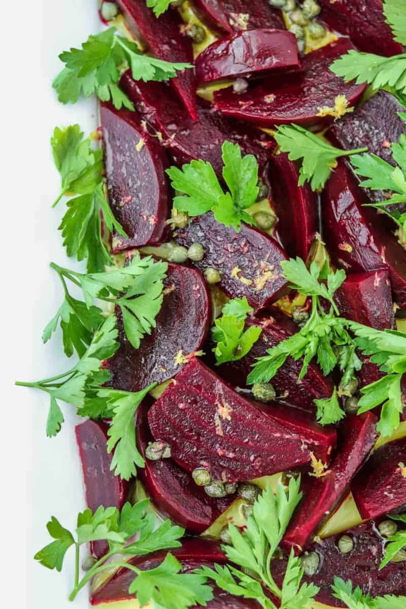 Pickled Beet Salad with Capers, Lemon Zest and Parsley on a platter.