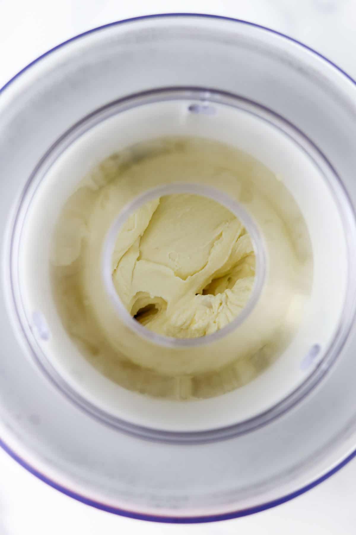 Overhead shot of ice cream in an ice cream maker.