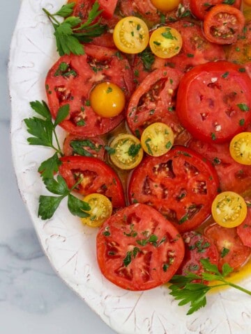 Marinated Garden Tomatoes on a platter.