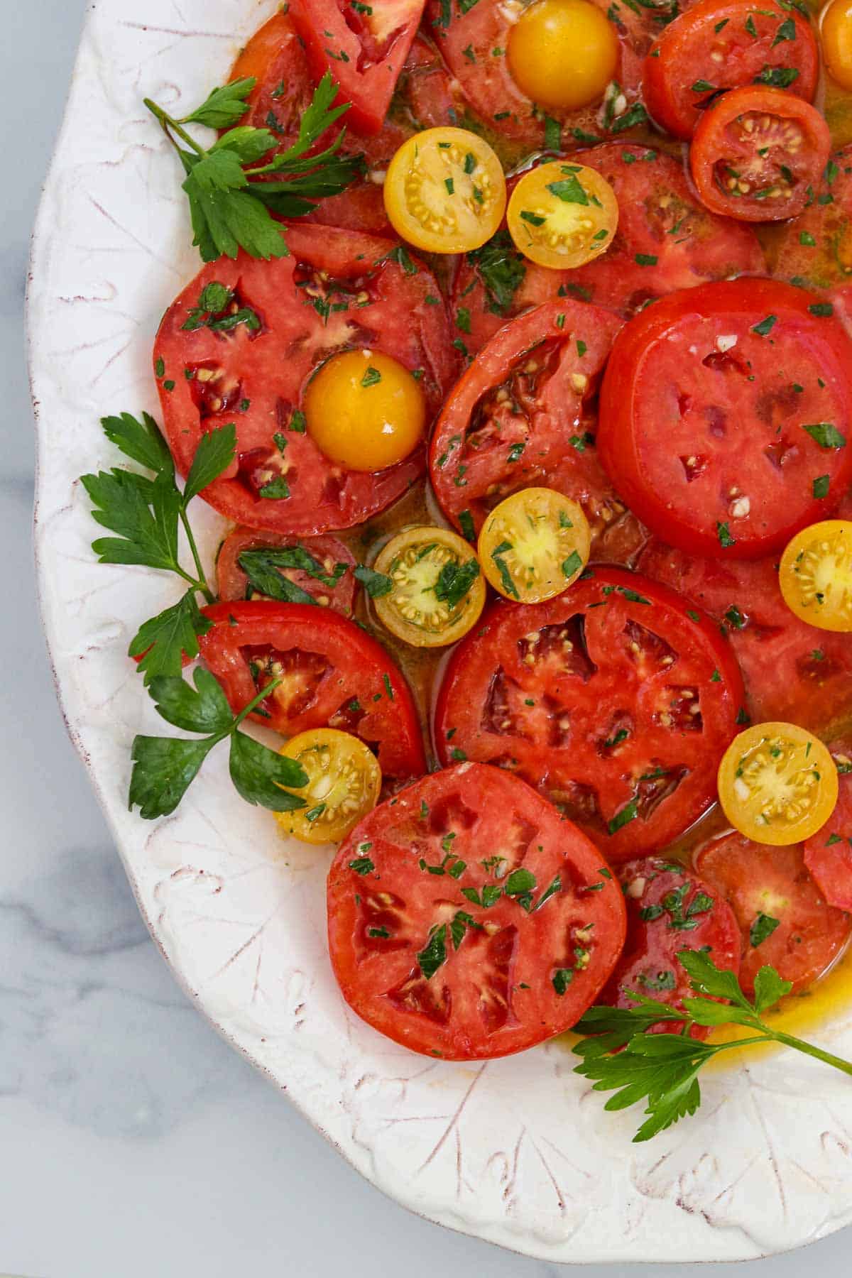 Marinated Garden Tomatoes on a platter.