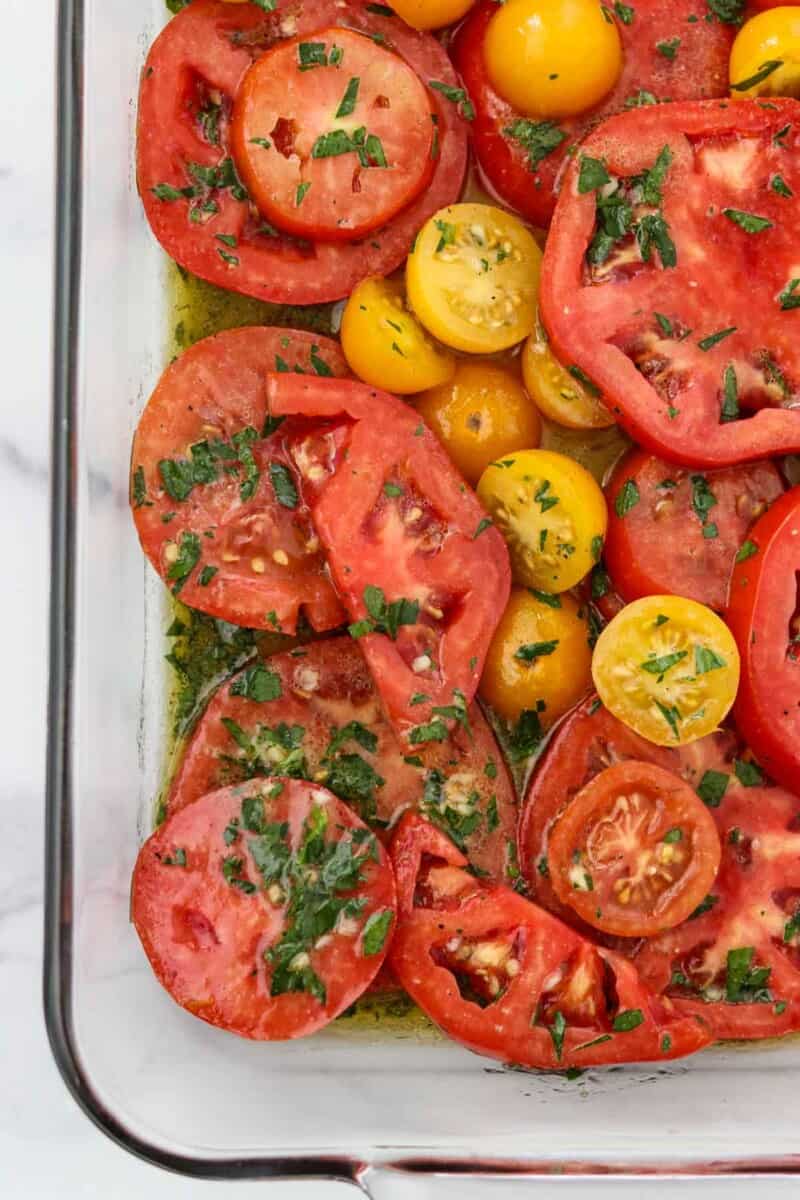 Marinated Garden Tomatoes in a glass dish.