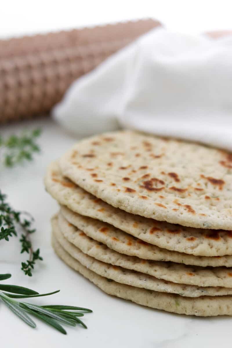 Close up of a stack of flatbreads.