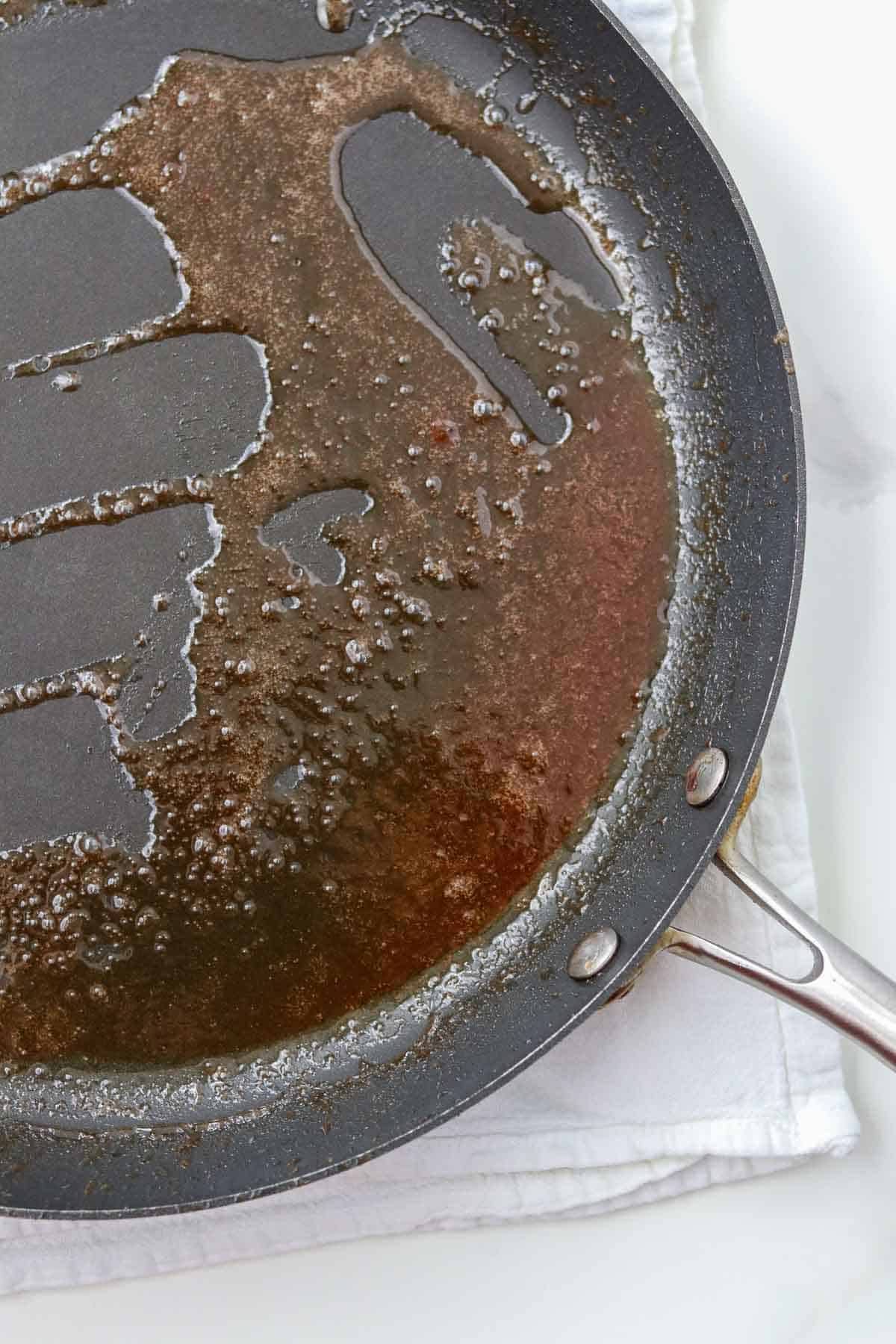 Syrup in a skillet.