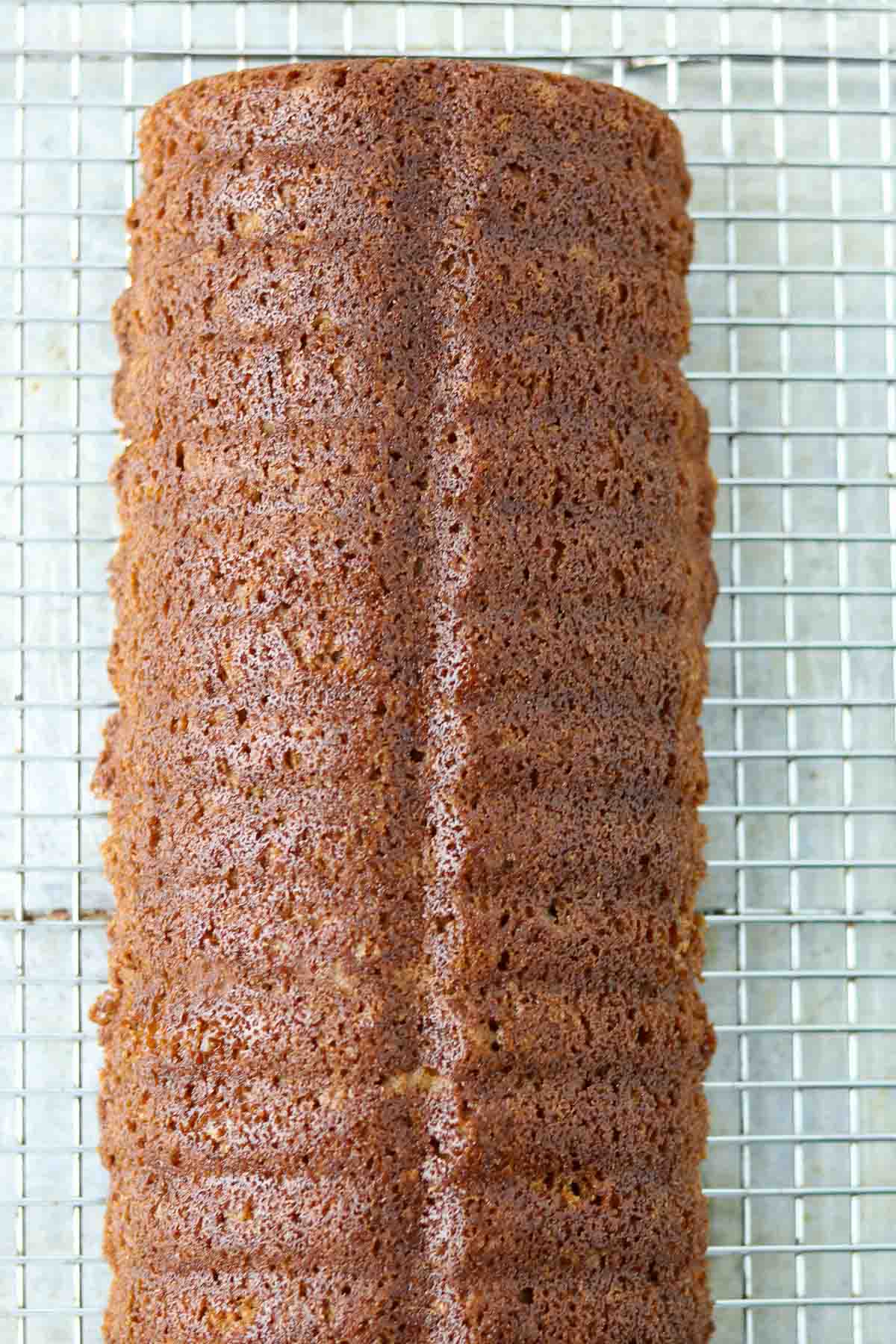 Baked Swedish Spice Cake on a wire cooling rack.