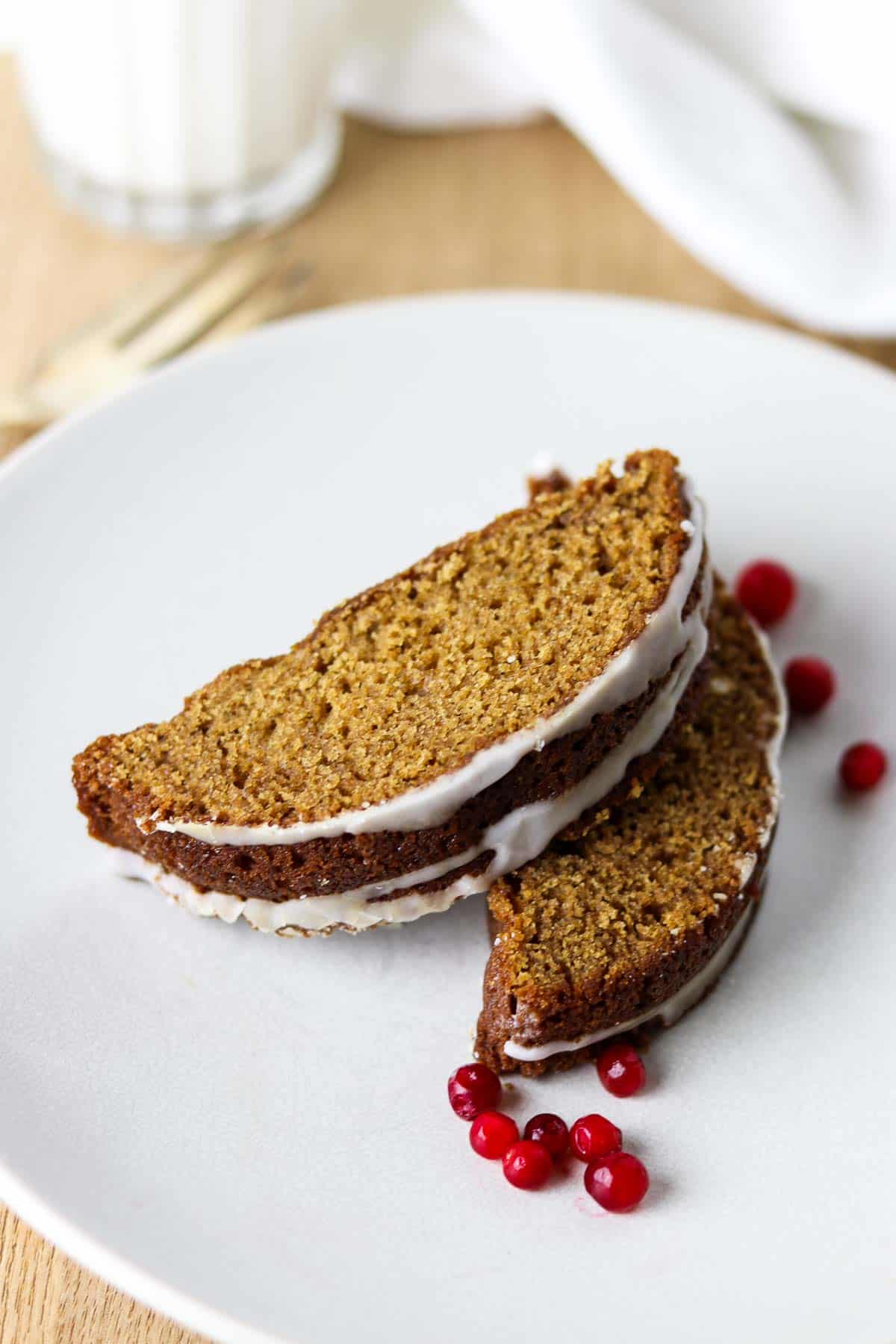 Swedish Spice Cake on a plate with lingonberries.