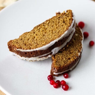 Close up of slices of Swedish Spice Cake with lingonberries.