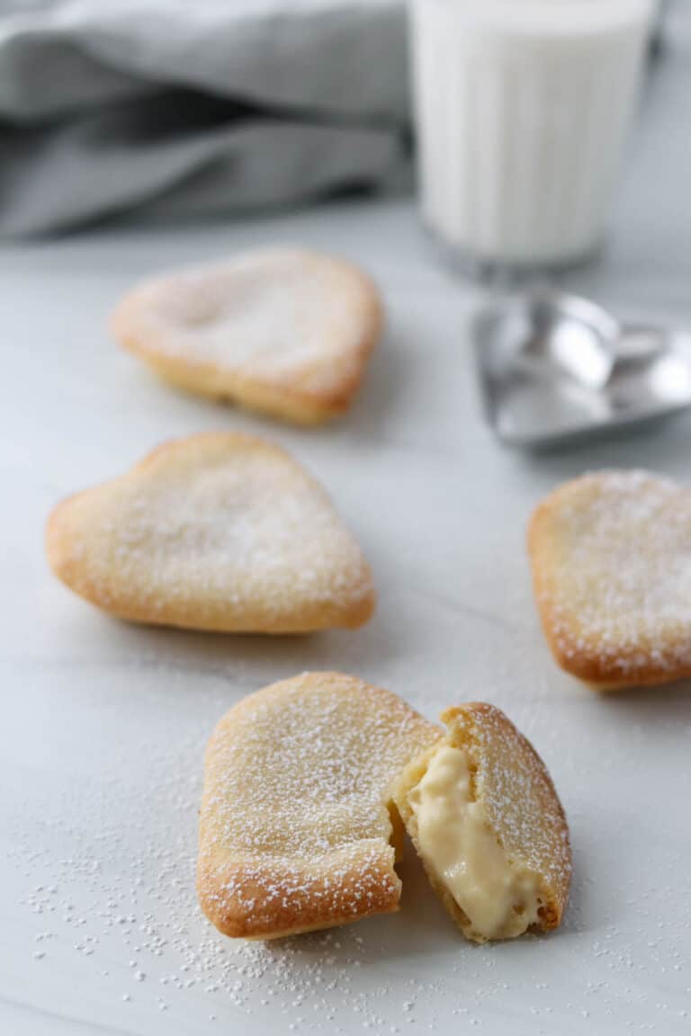 Close up of Swedish Custard Hearts broken in half.