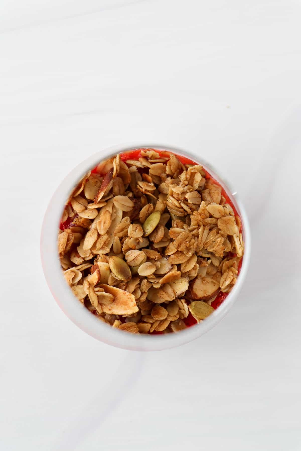 Overhead view of granola in a glass.