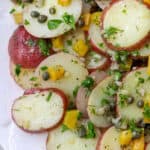 Close up of Herbed Potato Salad with Capers and Pickled Golden Beets.