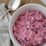 Swedish Beet Salad in a bowl with a spoon.