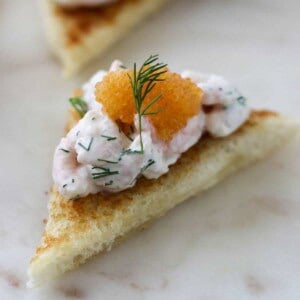 Close up of Toast Skagen topped with caviar.