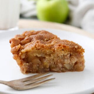 Swedish Apple Pie on a plate with a fork.