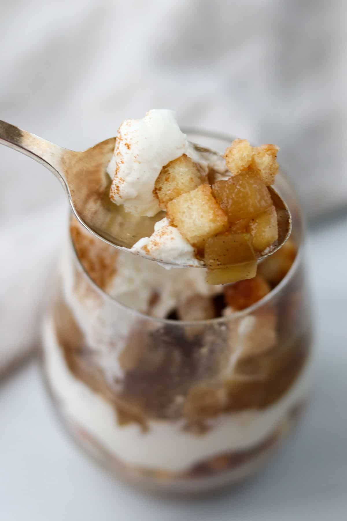 Spoonful of apple trifle.
