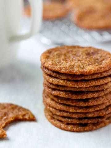 A close up of a stack of Swedish Ginger Cookies (Pepparkakor).