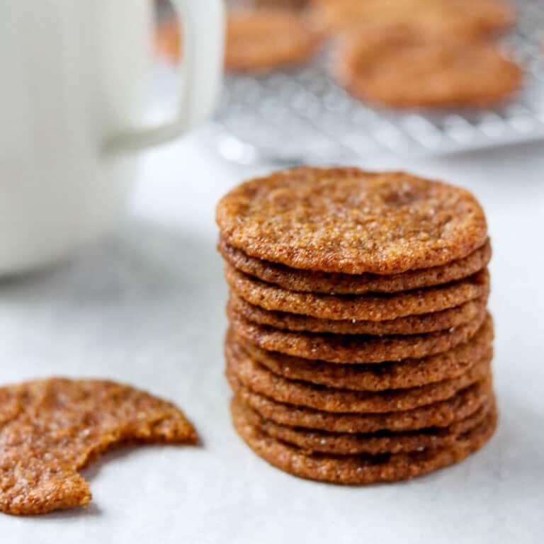 A close up of a stack of Swedish Ginger Cookies (Pepparkakor).