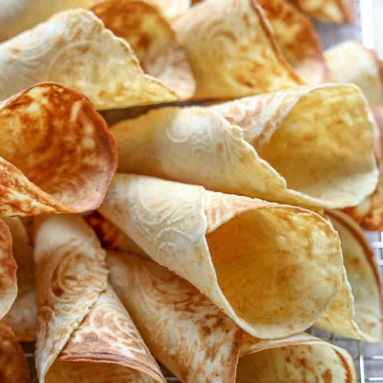 Close up of a pile of krumkaker.