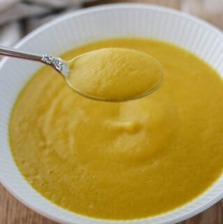Close up of Golden Beet Soup on a spoon.