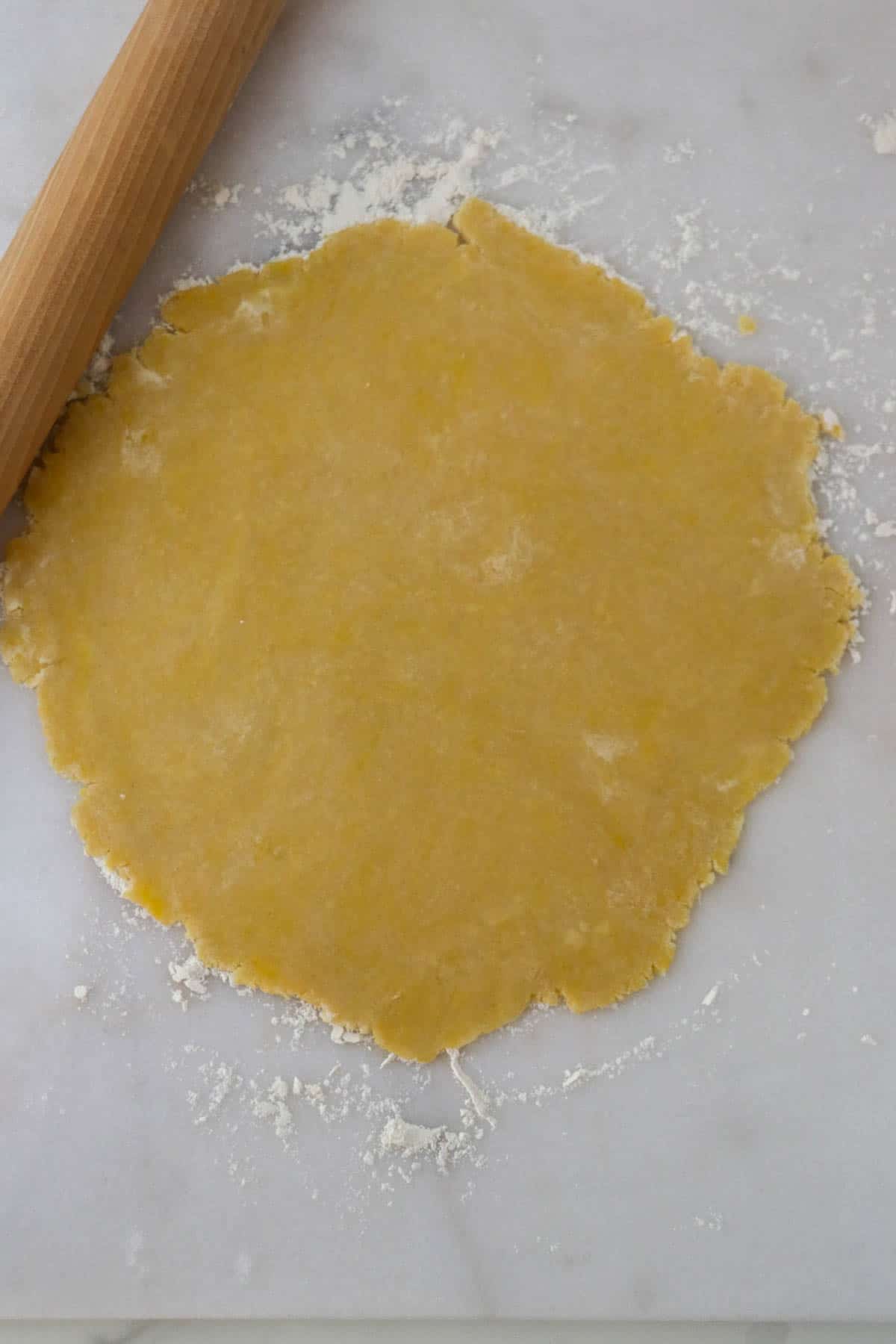 Rolled out dough for Lingonberry Almond Tart.