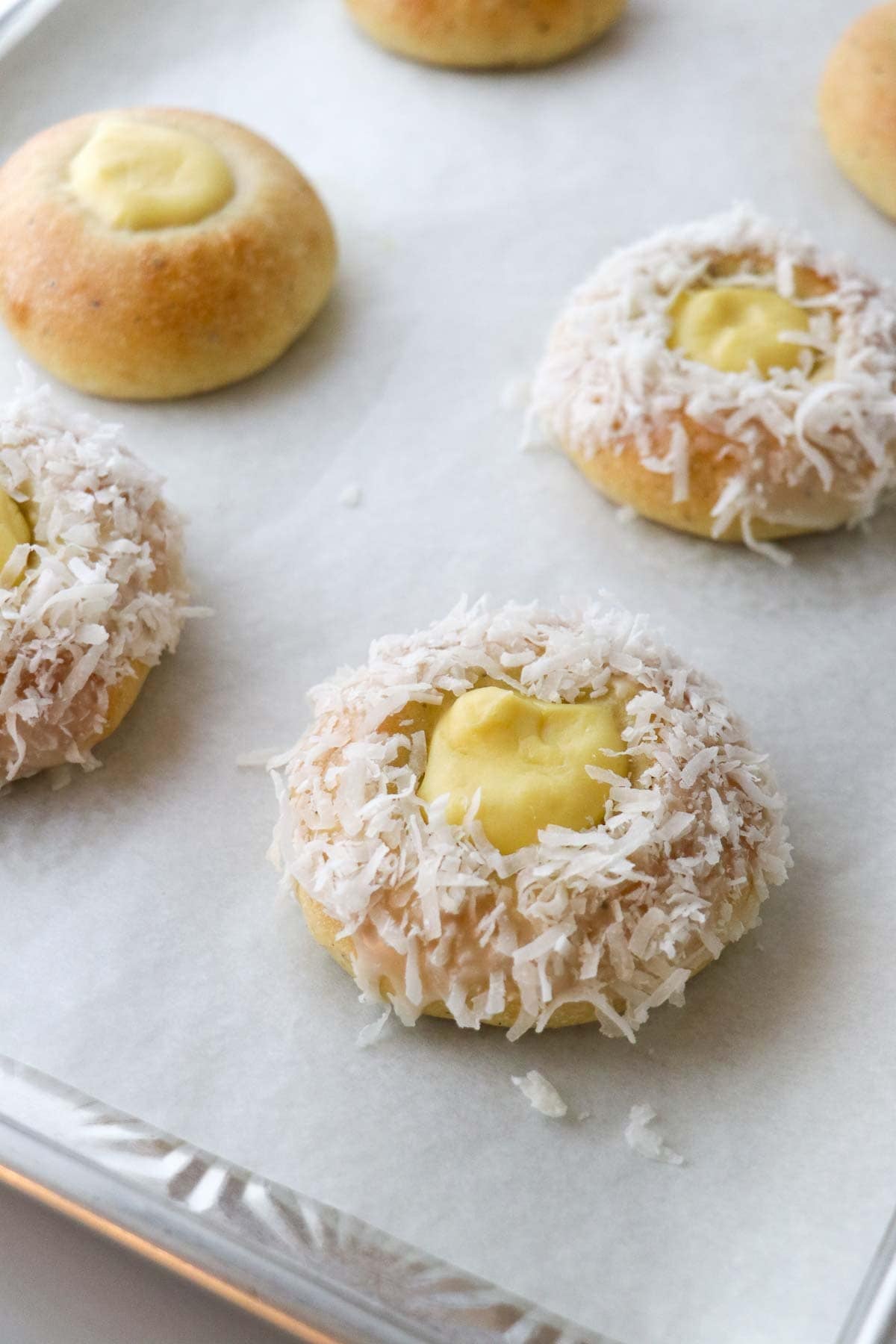 Norwegian Skoleboller sprinkled with coconut.