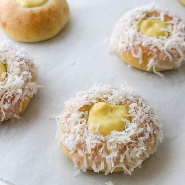 Norwegian Skoleboller on a baking sheet lined with parchment paper.