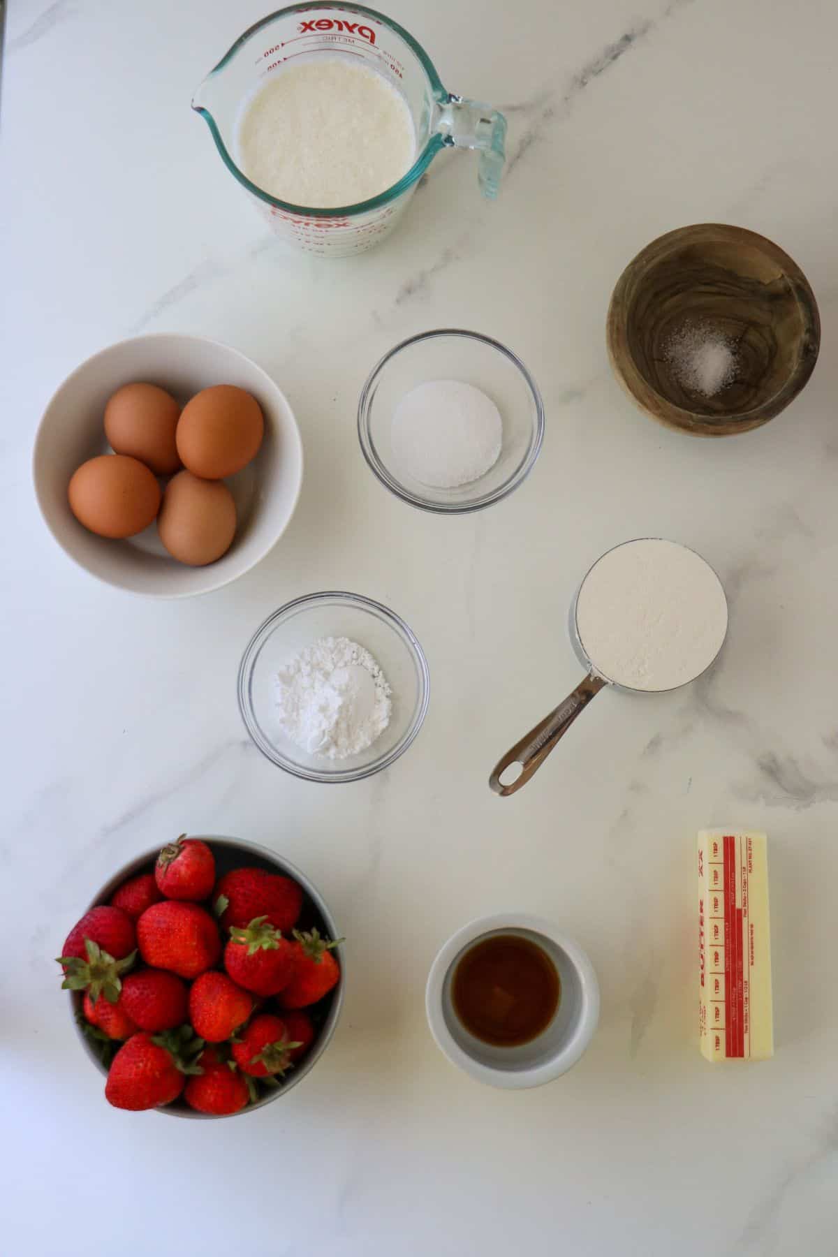 Ingredients needed to make Danish Cream Puffs: Eggs, cream, salt, sugar, powdered sugar, salt, flour, butter, vanilla.